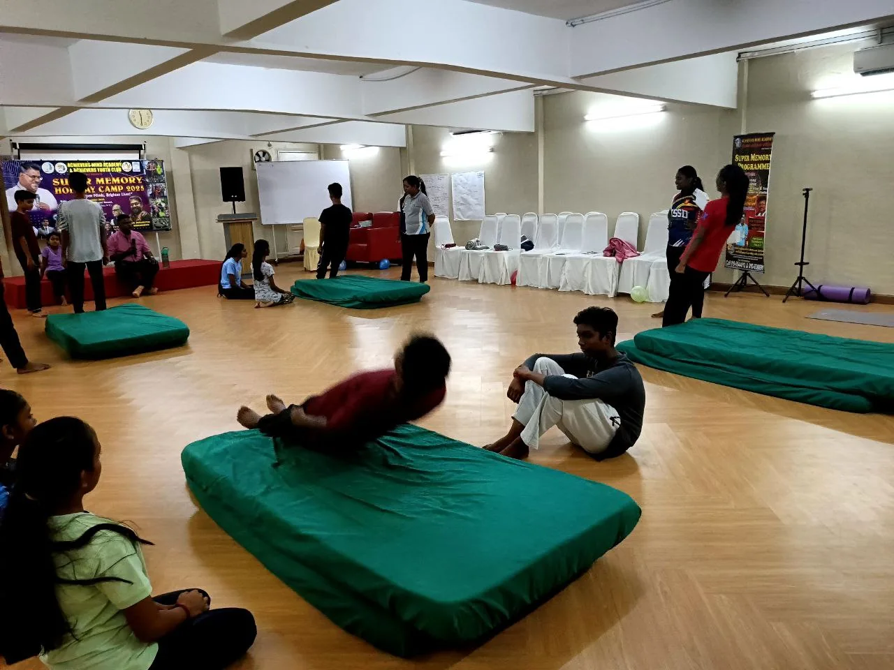 Holiday camp students taking part in a team exercise in 2025