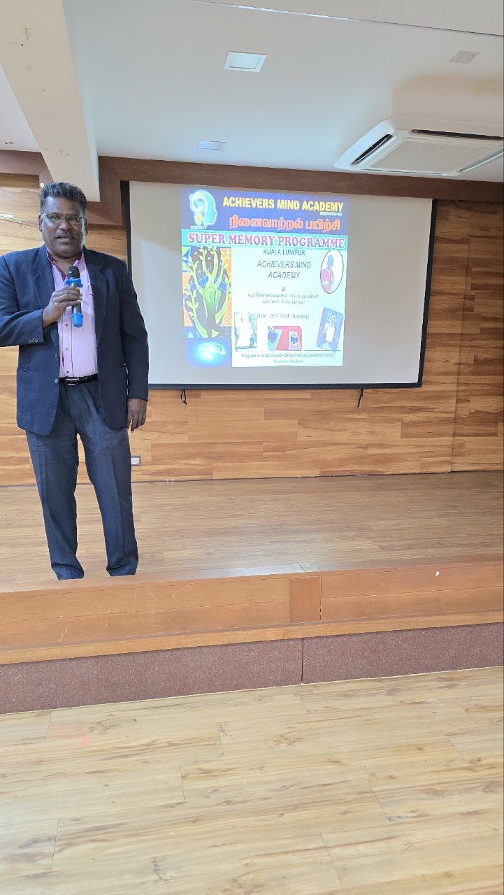 Master Alagan presenting the programme