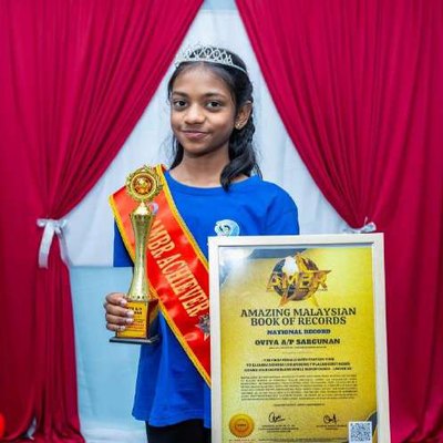 Oviya Sargunan with her Amazing Malaysian Book of Records certificate